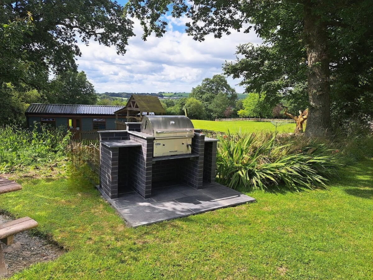 Outdoor barbecue area over looking football field